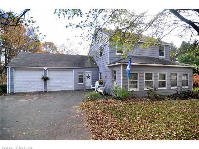 124 Ratlum Road Barkhamsted, CT 06063 - Photo 1 of 1 a front view of house with yard and trees around