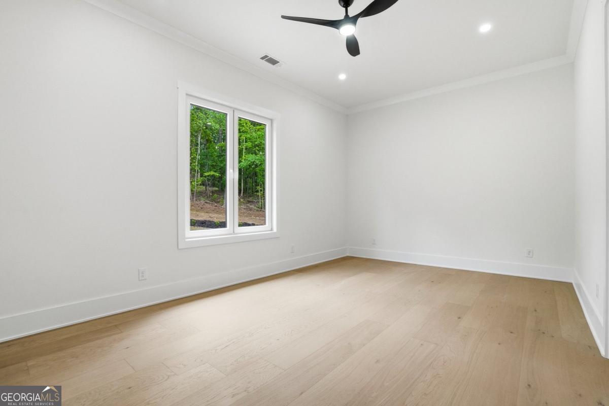 1557 Whitley Road Dacula, GA 30019 - Photo 28 of 46 an empty room with a window