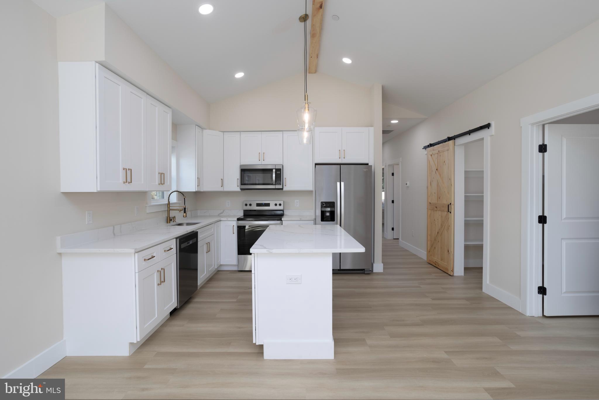 8 Sunrise Avenue Ridgely, MD 21660 - Photo 11 of 23 Modern kitchen with sleek finishes.