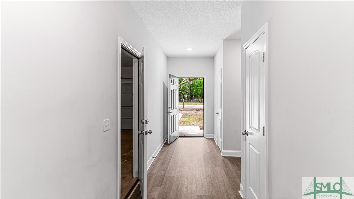 436 Talmadge Road Allenhurst, GA 31301 - Photo 12 of 30 Hallway looking towards front door