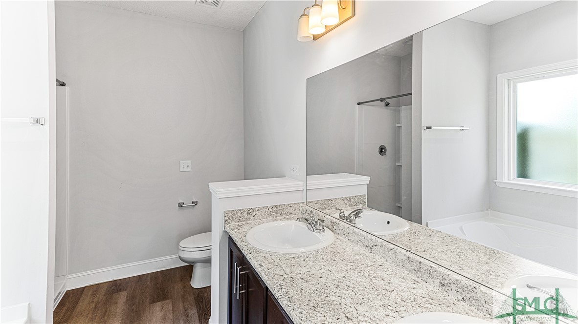 436 Talmadge Road Allenhurst, GA 31301 - Photo 19 of 30 Primary Bedroom En Suite Bathroom