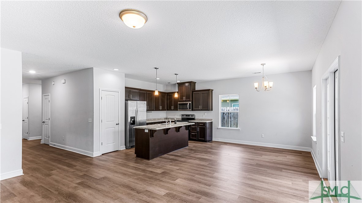 436 Talmadge Road Allenhurst, GA 31301 - Photo 10 of 30 Living, Dining & Kitchen