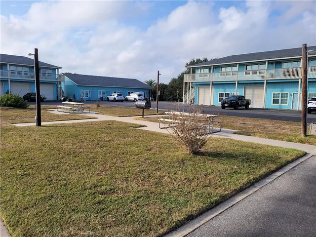 a view of a house with swimming pool