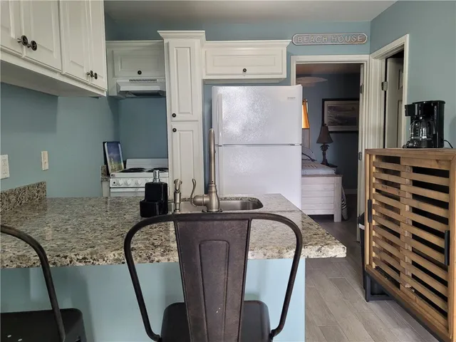 a dining room with furniture