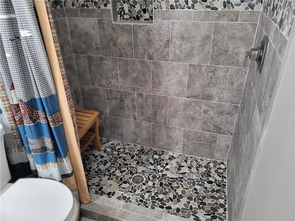 a bathroom with a sink and toilet