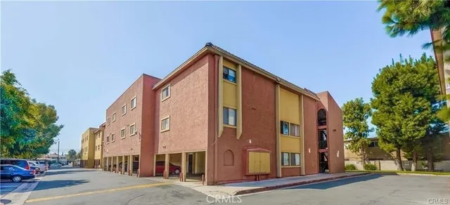 a tall building sitting on the side of a street