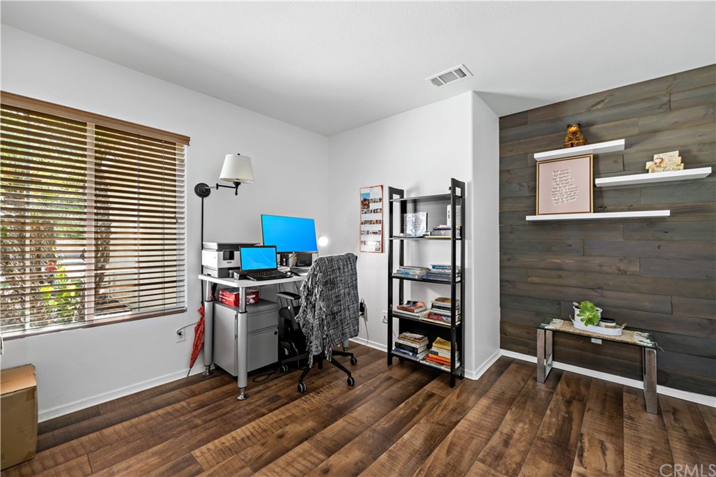 36661 Beech Street Winchester, CA 92596 - Photo 16 of 33 a view of a workspace with furniture and a window