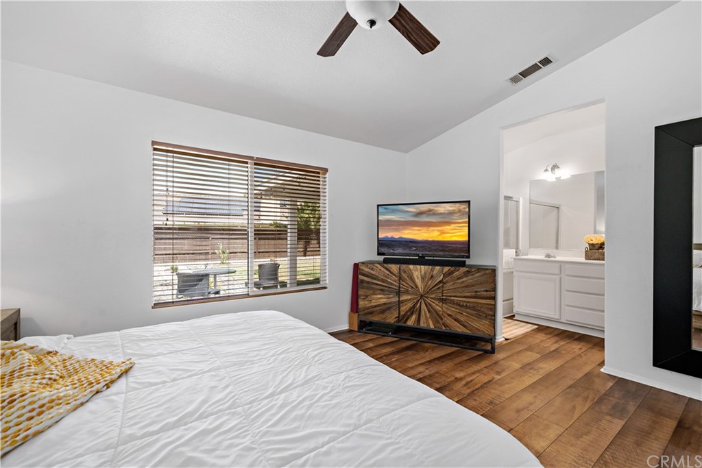 36661 Beech Street Winchester, CA 92596 - Photo 18 of 33 a bedroom with a bed and a couch