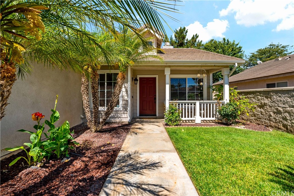 36661 Beech Street Winchester, CA 92596 - Photo 2 of 33 a view of a house with a small yard and floor to ceiling window
