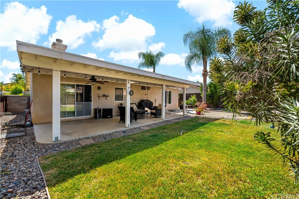 36661 Beech Street Winchester, CA 92596 - Photo 25 of 33 a view of a house with backyard porch and sitting area