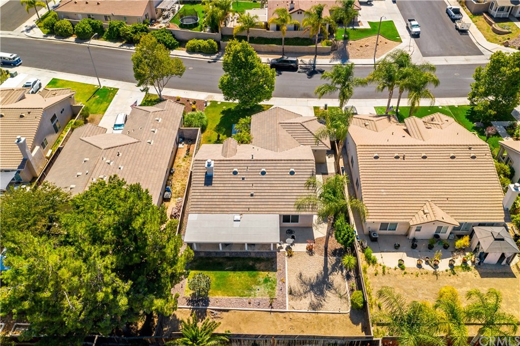 36661 Beech Street Winchester, CA 92596 - Photo 28 of 33 an aerial view of residential houses with outdoor space and parking