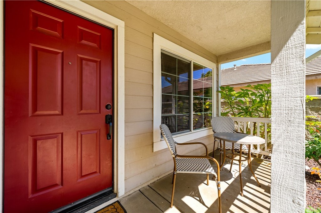 36661 Beech Street Winchester, CA 92596 - Photo 30 of 33 a balcony with chairs and a window