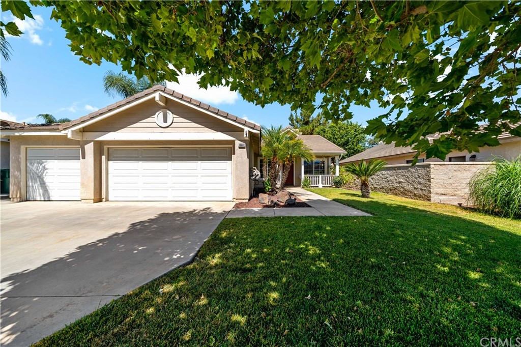 36661 Beech Street Winchester, CA 92596 - Photo 32 of 33 a front view of a house with yard and green space