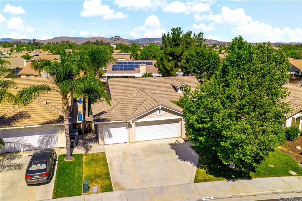 36661 Beech Street Winchester, CA 92596 - Photo 4 of 33 a view of houses with outdoor space and street view