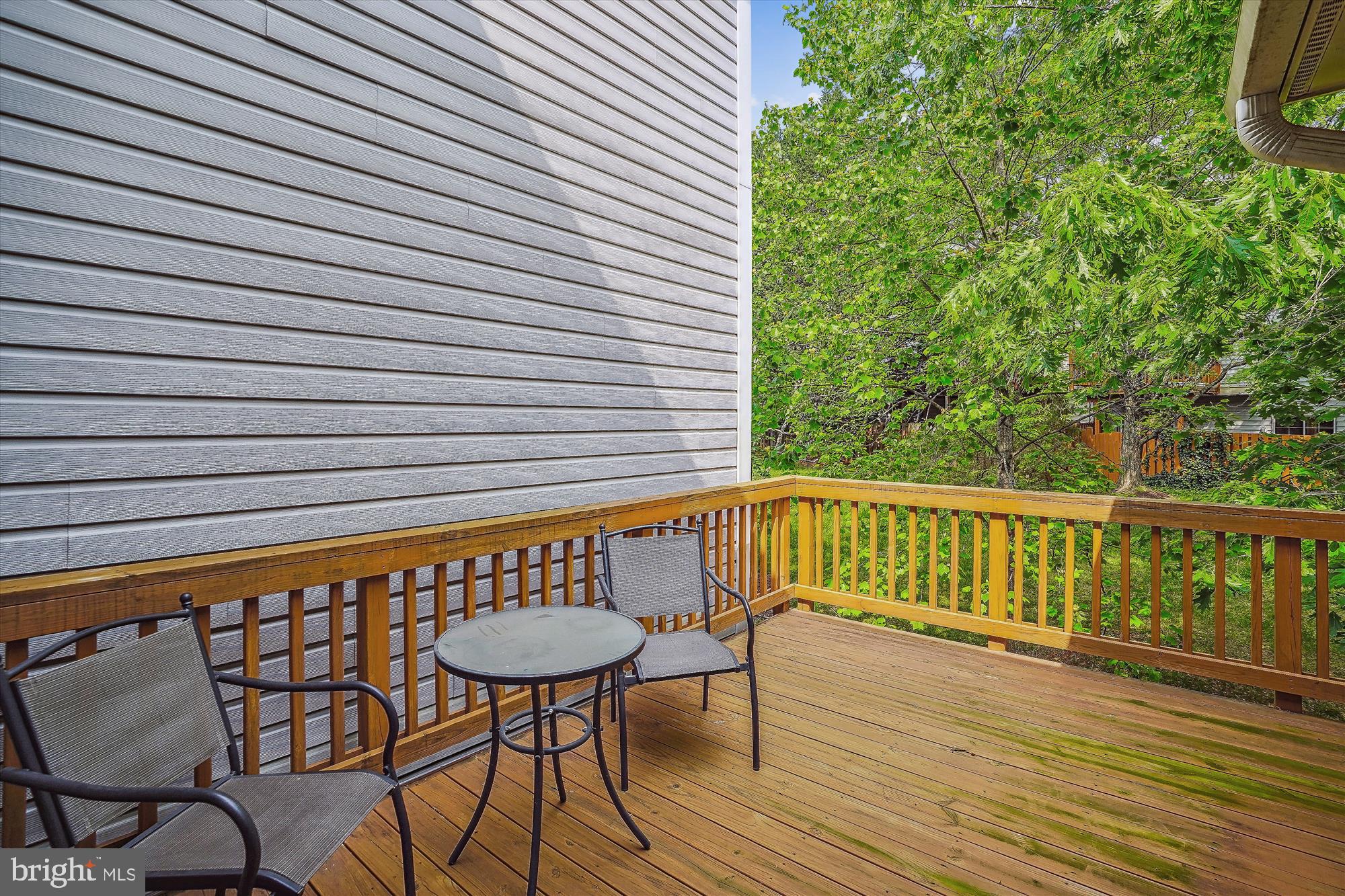 20944 Sandstone Square Sterling, VA 20165 - Photo 13 of 26 Main floor deck off kitchen