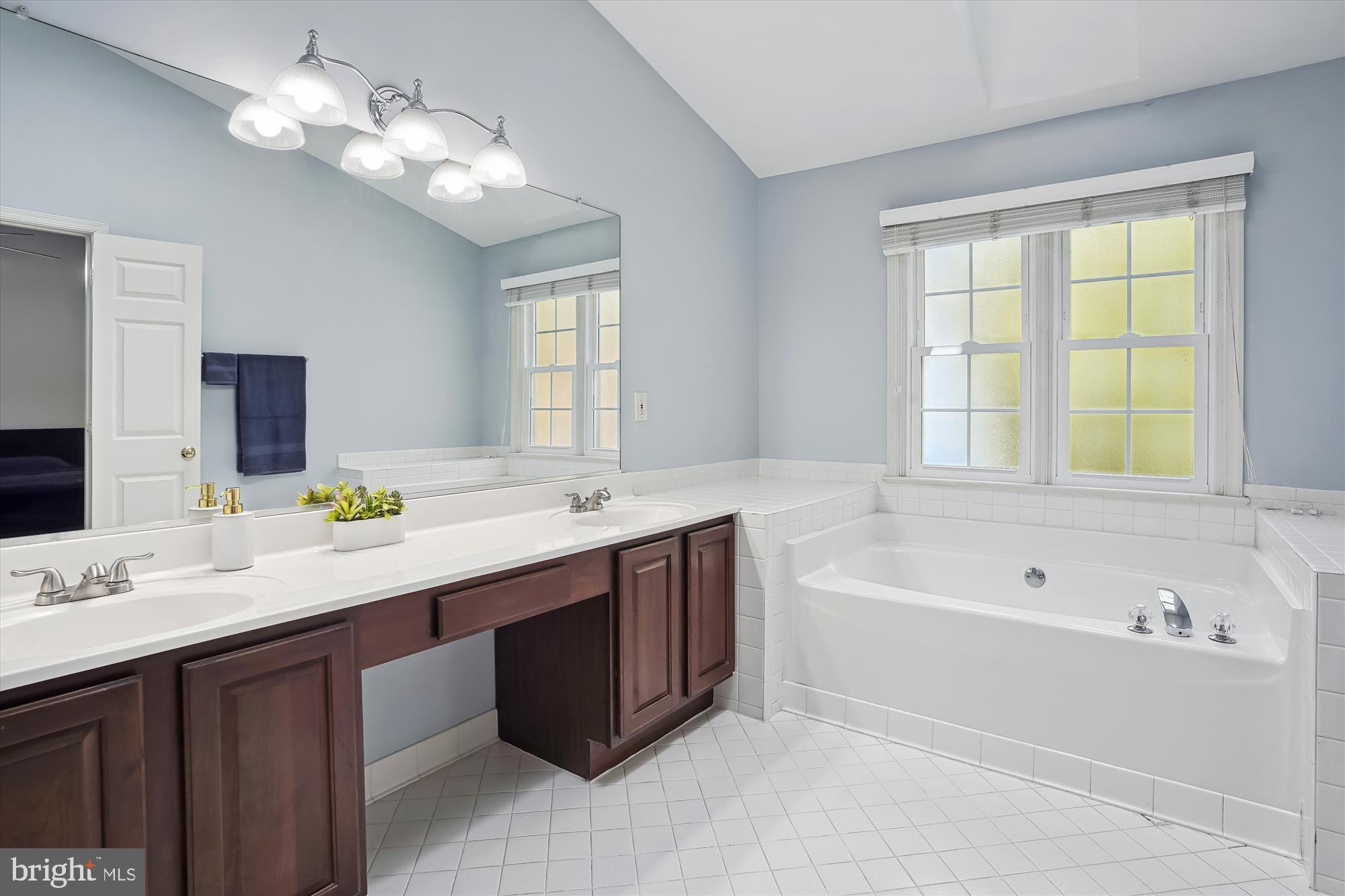 20944 Sandstone Square Sterling, VA 20165 - Photo 16 of 26 Primary bath with dual vanities and soaking tub
