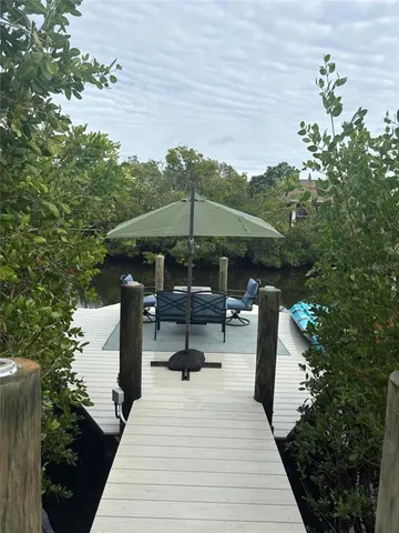 a view of backyard with seating space