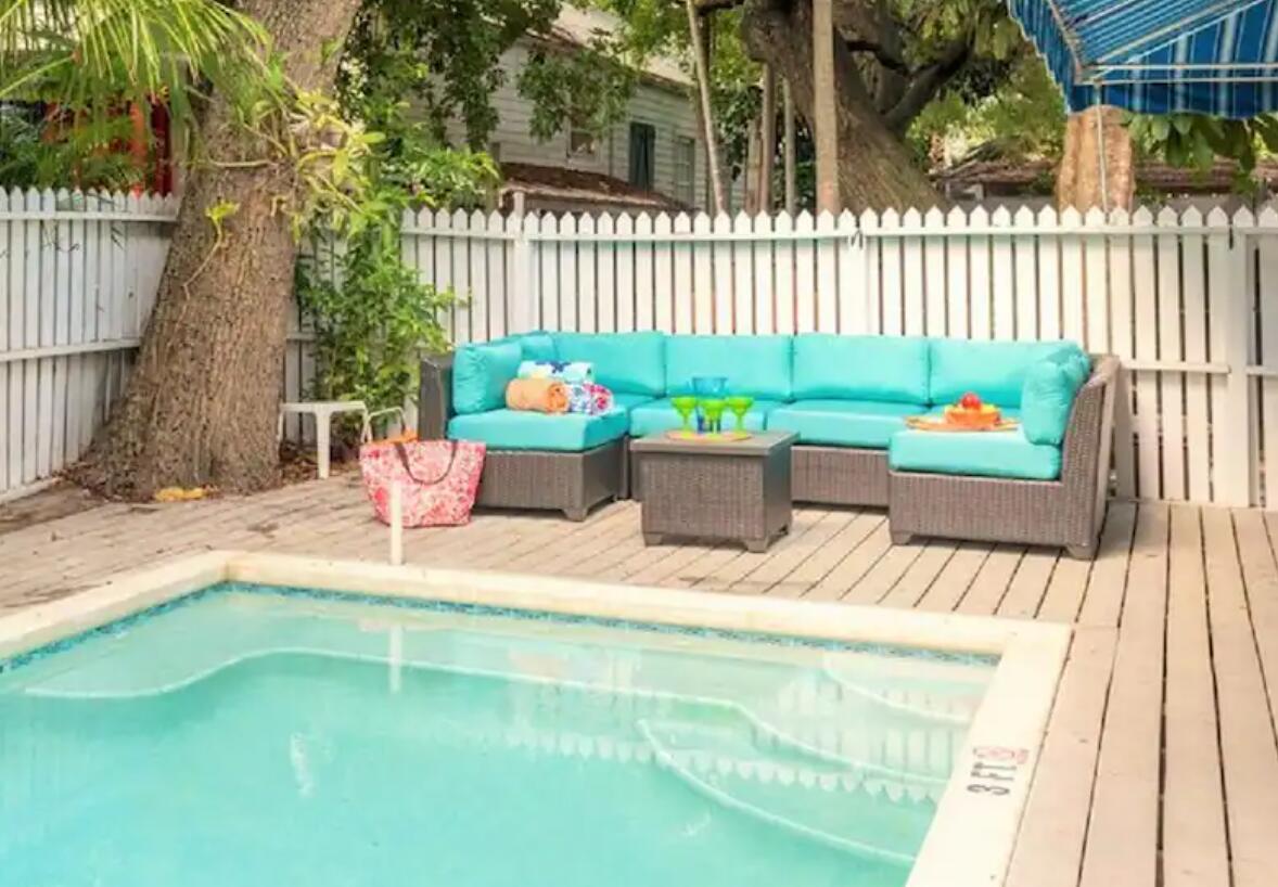 906 Truman Avenue, Unit 1 Key West, FL 33040 - Photo 10 of 12 a outdoor view with a seating space