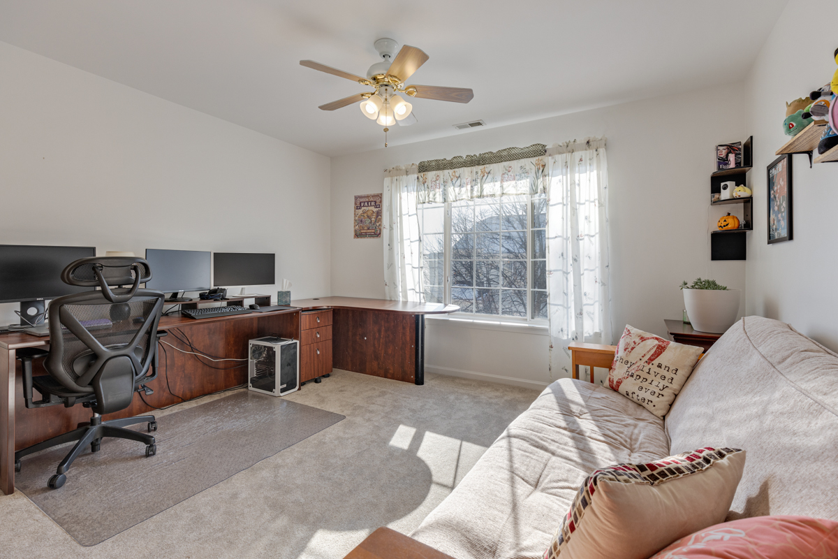 232 New Haven Drive Cary, IL 60013 - Photo 15 of 25 a bed room with a bed and a window