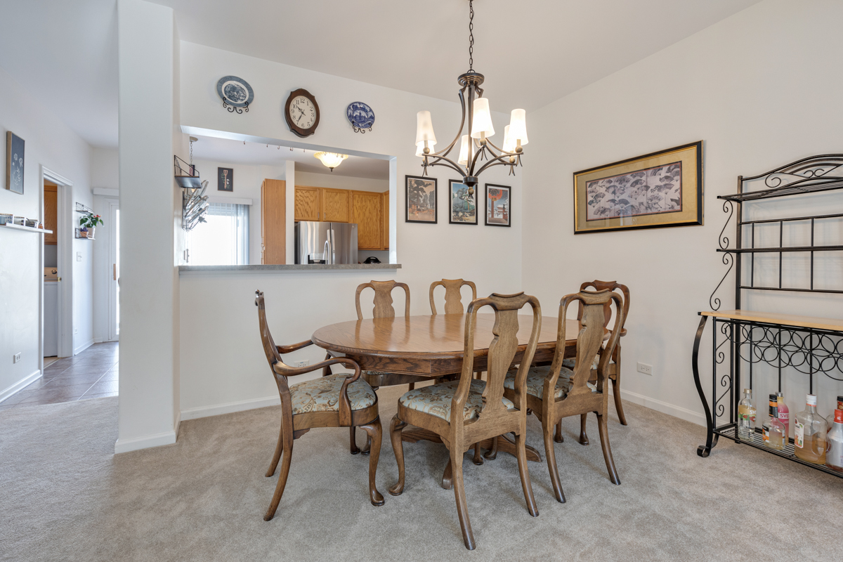 232 New Haven Drive Cary, IL 60013 - Photo 22 of 25 a view of a dining room with furniture