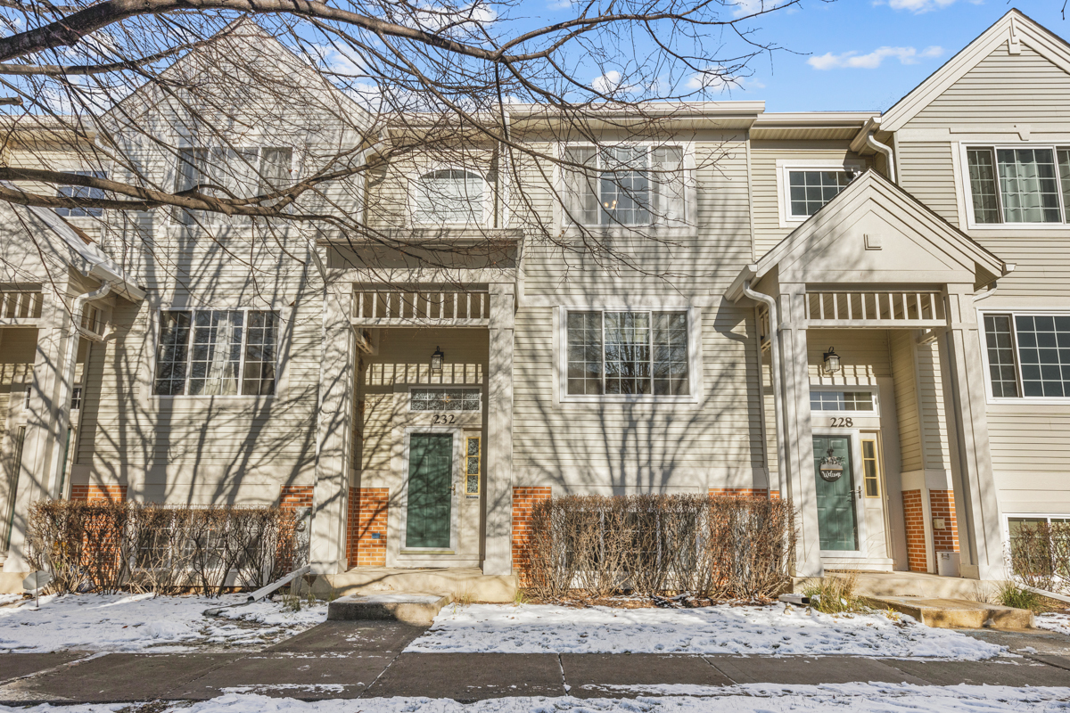 232 New Haven Drive Cary, IL 60013 - Photo 25 of 25 a view of a street with a building in the background