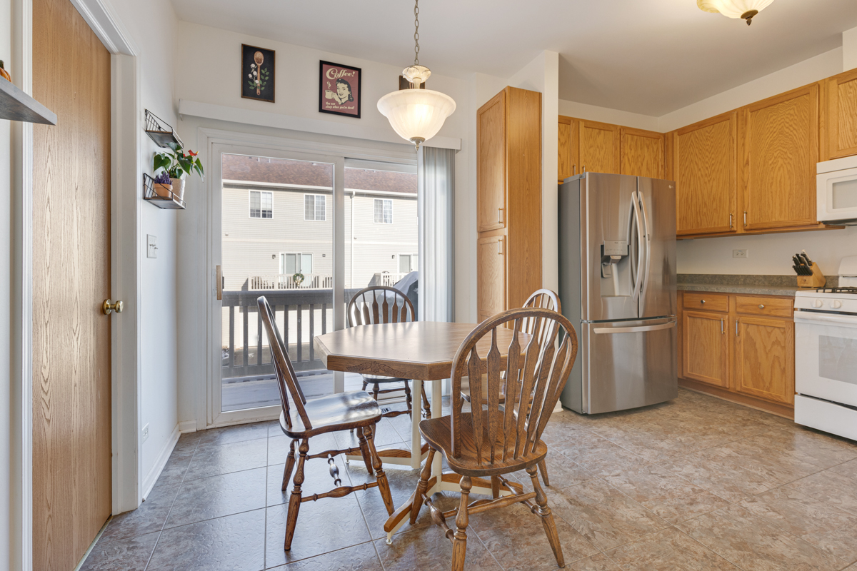 232 New Haven Drive Cary, IL 60013 - Photo 8 of 25 a dining room with furniture and window