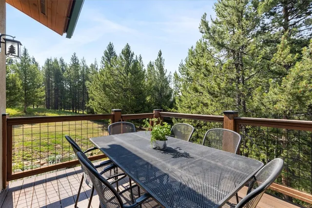 a balcony with wooden floor