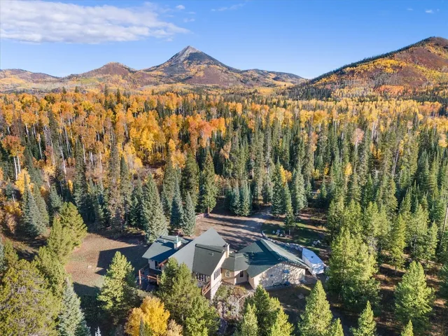 a view of a city with mountains in the background