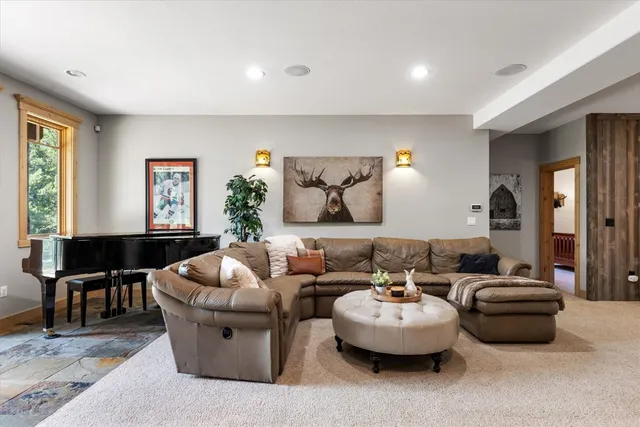a living room with furniture and window