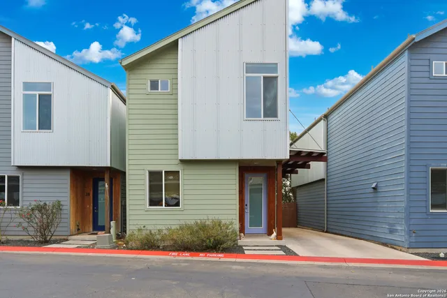a kitchen with a sink stove and microwave