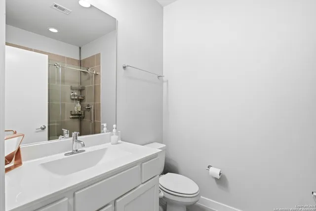 a front view of a house with garage