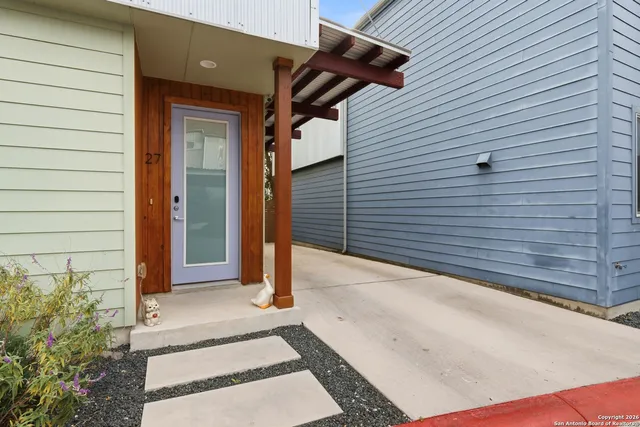a front view of a house with garage