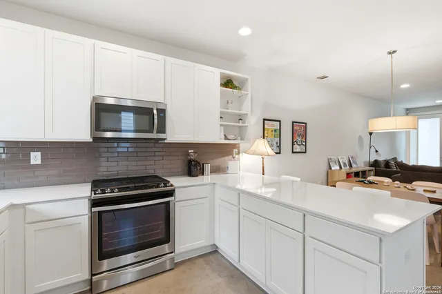 a view of a dining room with furniture