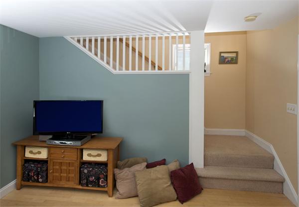 6 Damien Road Wellesley, MA 02481 - Photo 4 of 8 a living room with furniture and a flat screen tv
