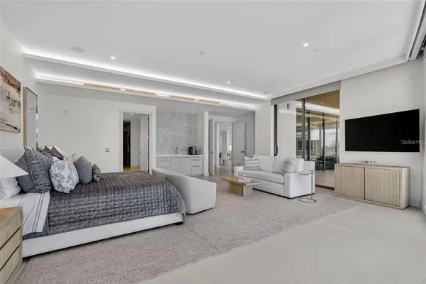 a chairs and table in a balcony