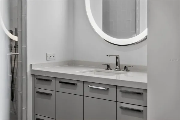 a bathroom with a shower and a toilet