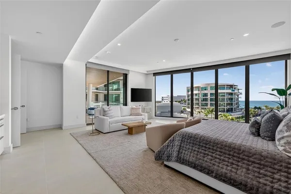 a view of a living room and dining room