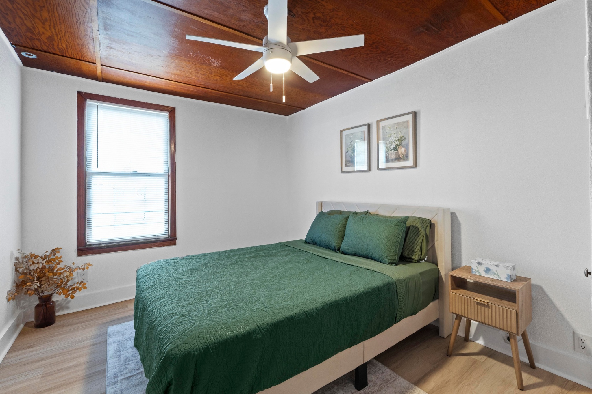 1308 East 12th Street, Unit A Austin, TX 78702 - Photo 21 of 25 a bedroom with a bed and a window