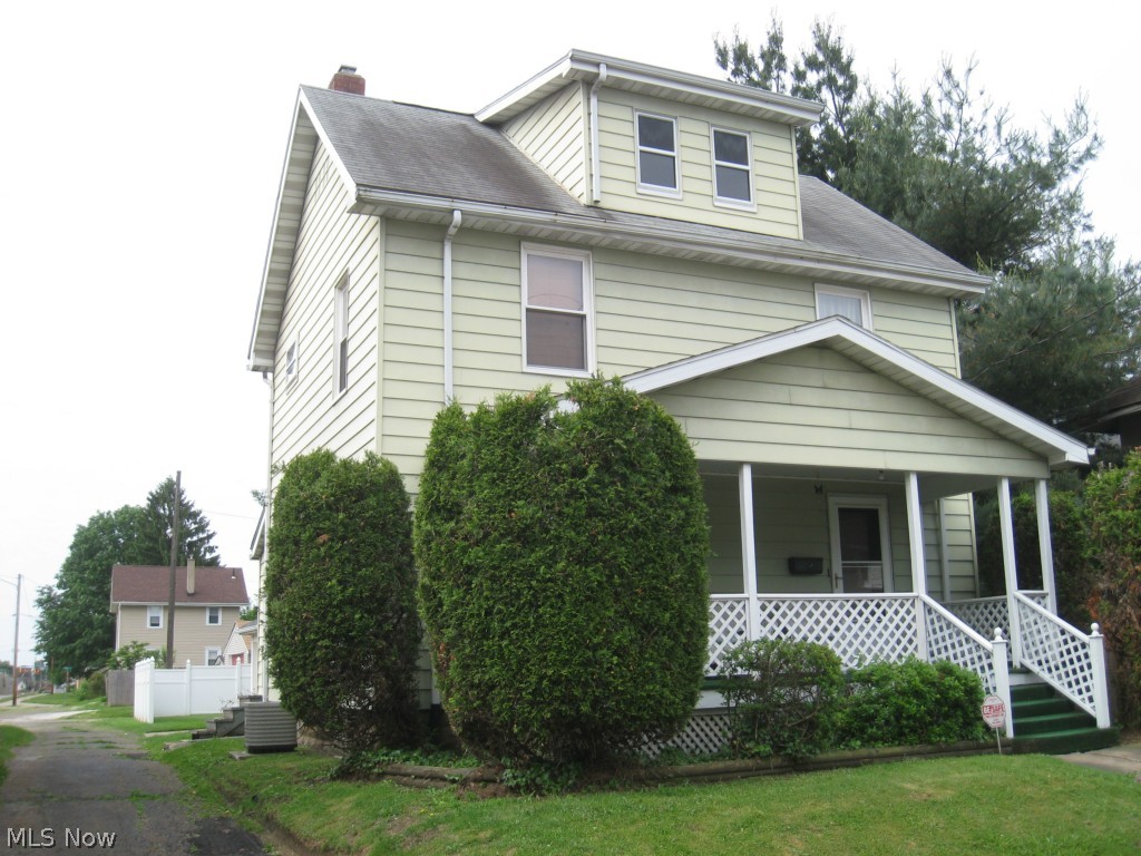 2226 7th Street Northwest Canton, OH 44708 - Photo 1 of 7 Well kept 3 bedroom vinyl sided home offers a spacious living room, dining room, kitchen with appliances, detached garage, fenced yard, new central air conditioning, vinyl windows and a covered front porch.