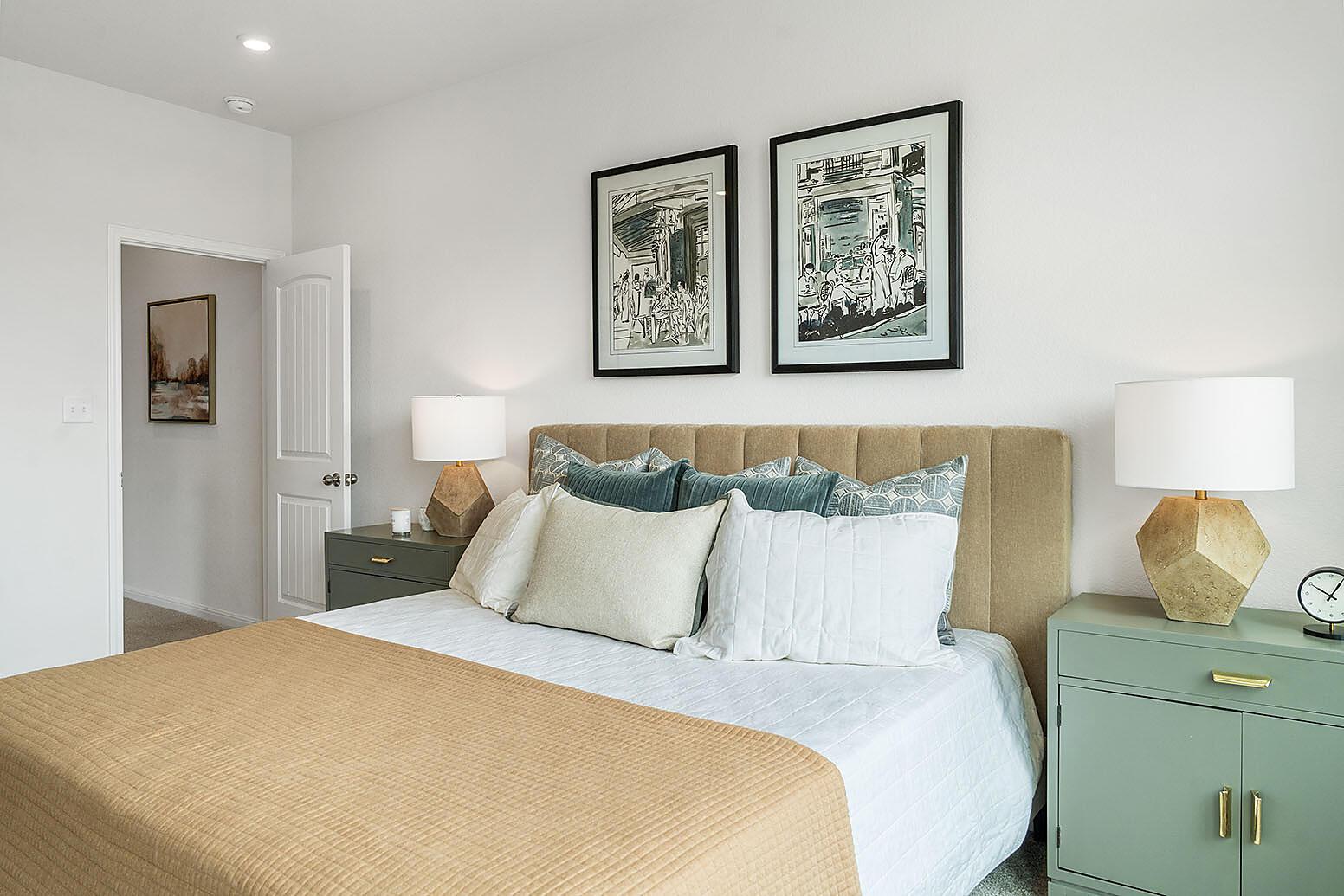20603 B Combine Path Pflugerville, TX 78660 - Photo 12 of 19 Relax in this well-lit bedroom featuring a comfortable bed and ample space.