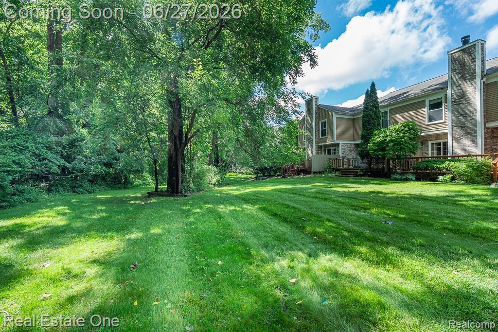 1222 Kings Cove Court, Unit 244 Rochester, MI 48306 - Photo 43 of 44 Desirable yard with lots of green space!