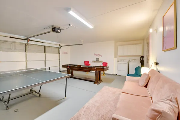 a bedroom with furniture and a table