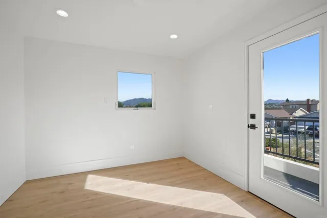 a view of a room with a large window