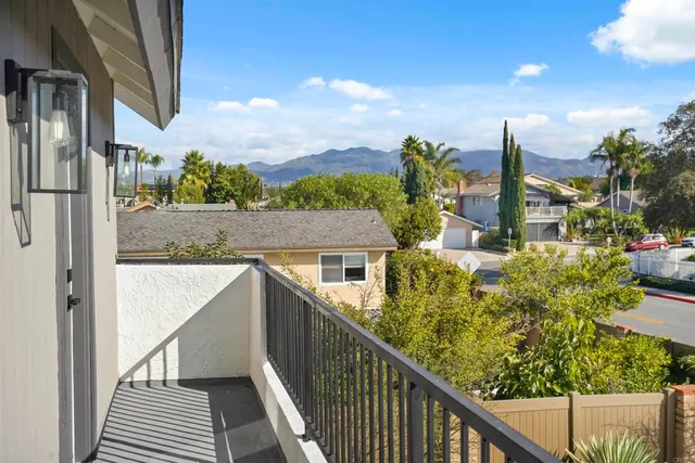 a view of balcony with furniture
