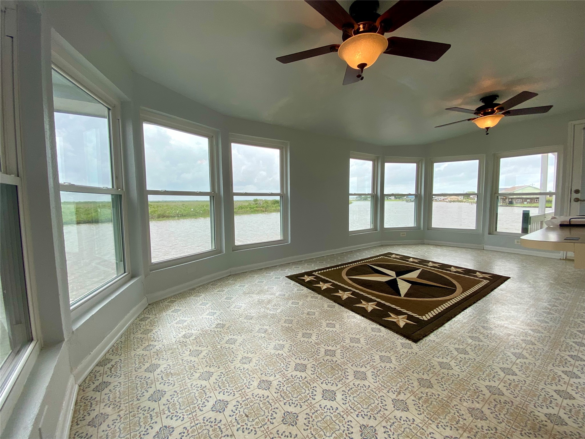102 Redfish Drive Freeport, TX 77541 - Photo 13 of 44 a living room with hard wood floor and a window
