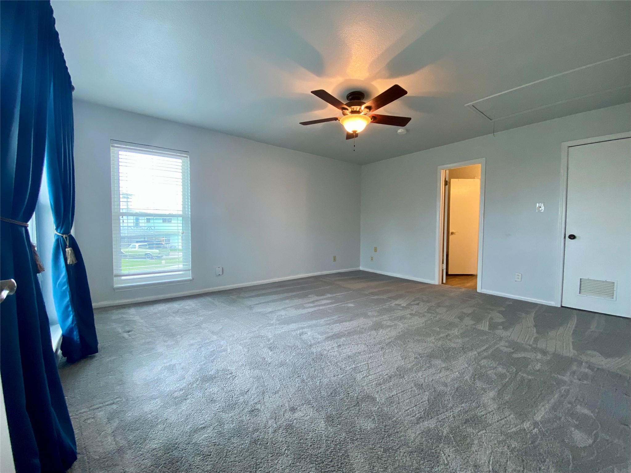 102 Redfish Drive Freeport, TX 77541 - Photo 18 of 44 a view of a livingroom with a ceiling fan and window