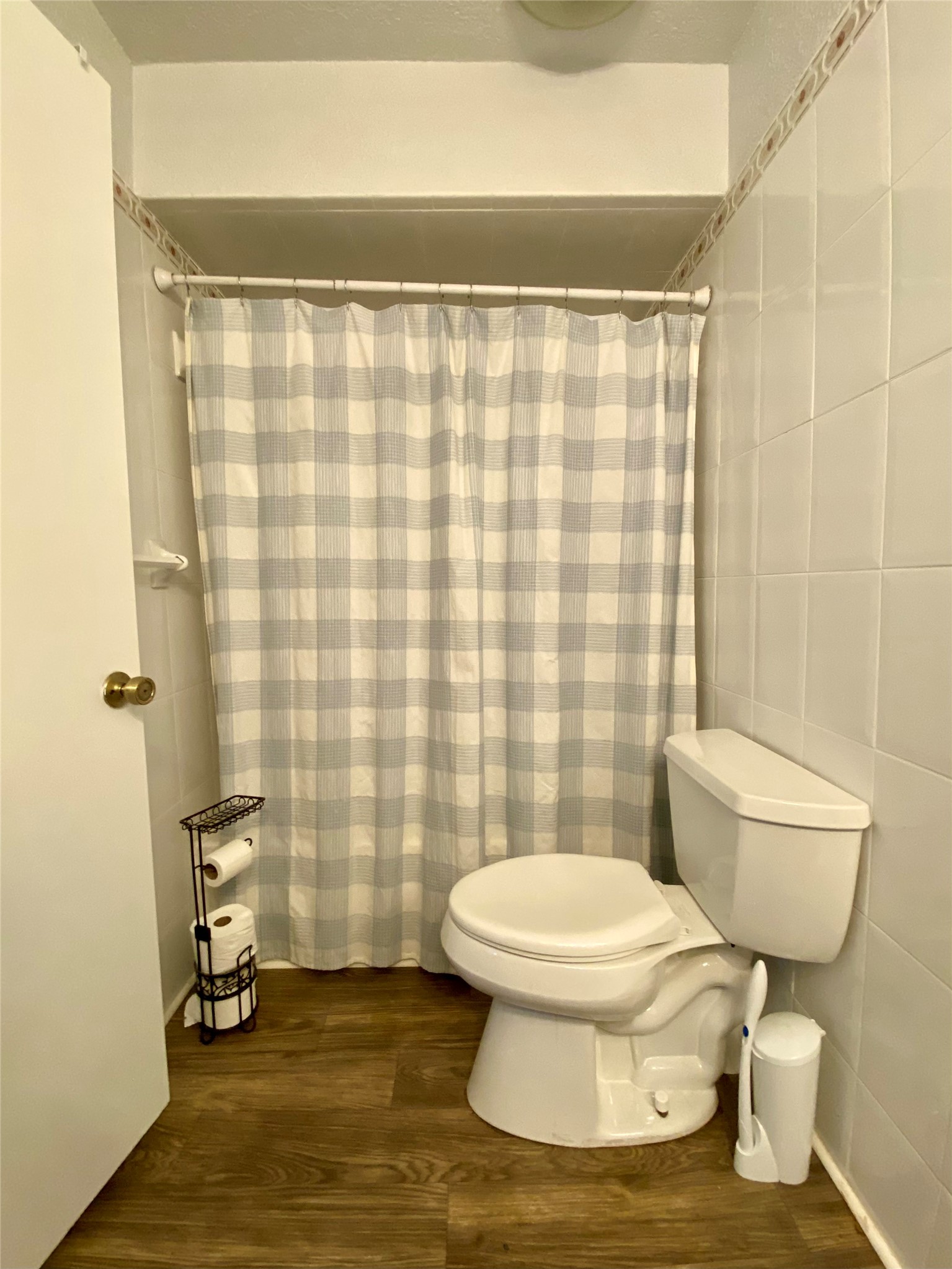 102 Redfish Drive Freeport, TX 77541 - Photo 20 of 44 a bathroom with a toilet and a shower