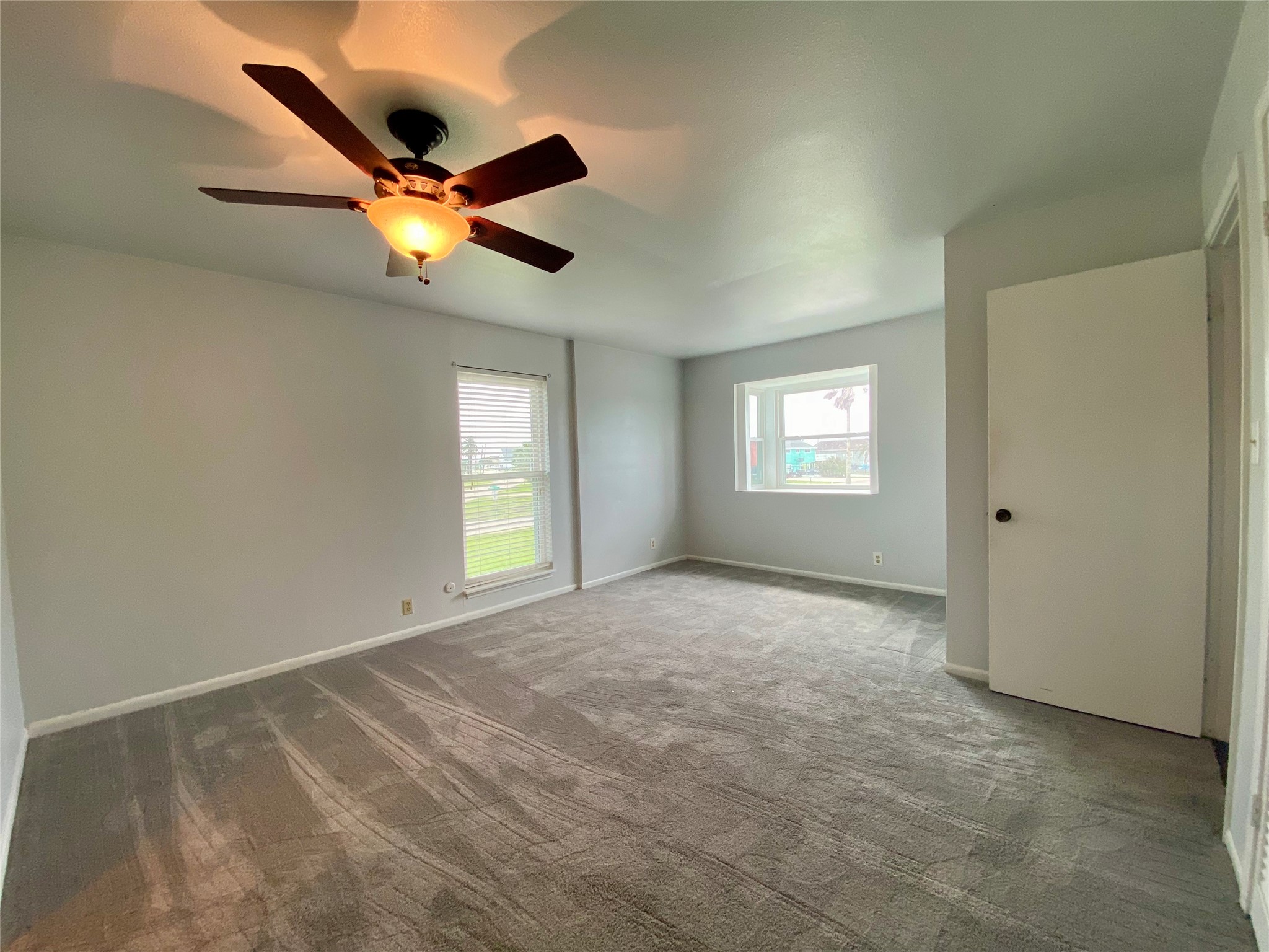 102 Redfish Drive Freeport, TX 77541 - Photo 25 of 44 a view of an empty room and window