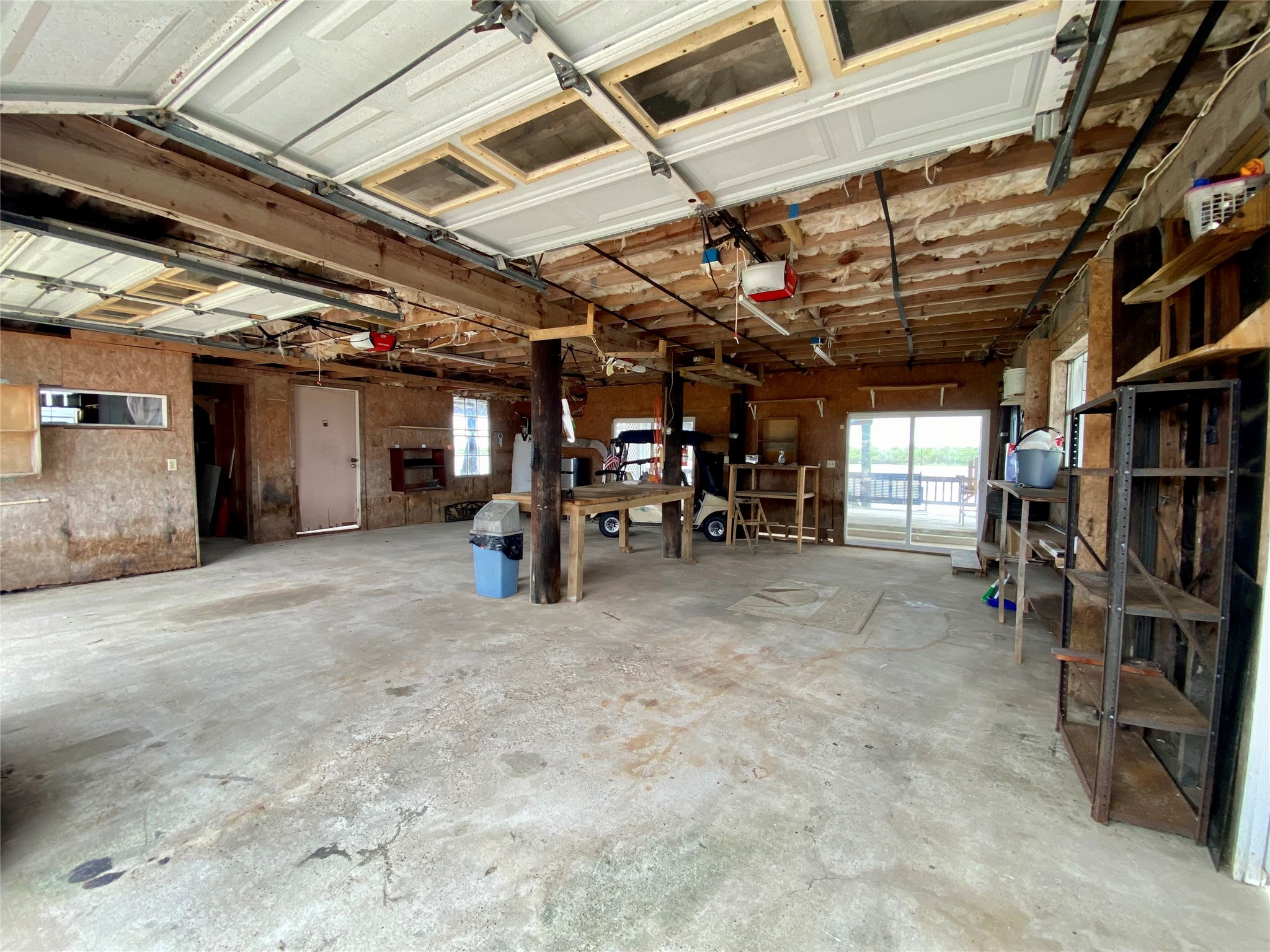 102 Redfish Drive Freeport, TX 77541 - Photo 40 of 44 a view of empty room with wooden ceiling