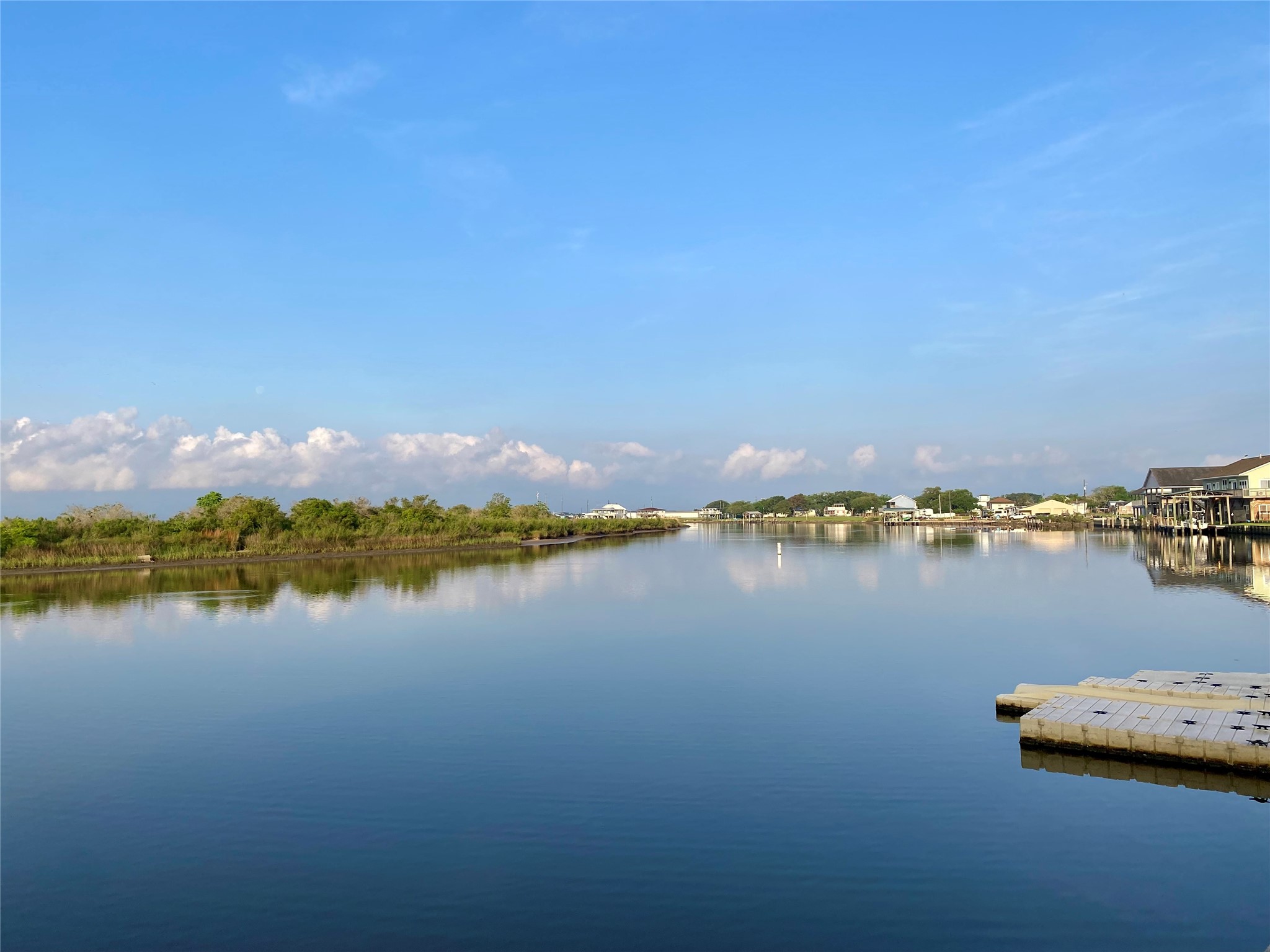 102 Redfish Drive Freeport, TX 77541 - Photo 4 of 44 a view of lake and city